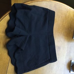 Black 4 inch scalloped shorts